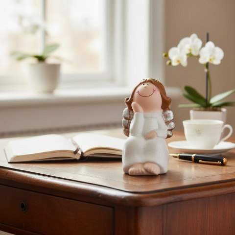 Ceramiczny siedzący Anioł 11 cm